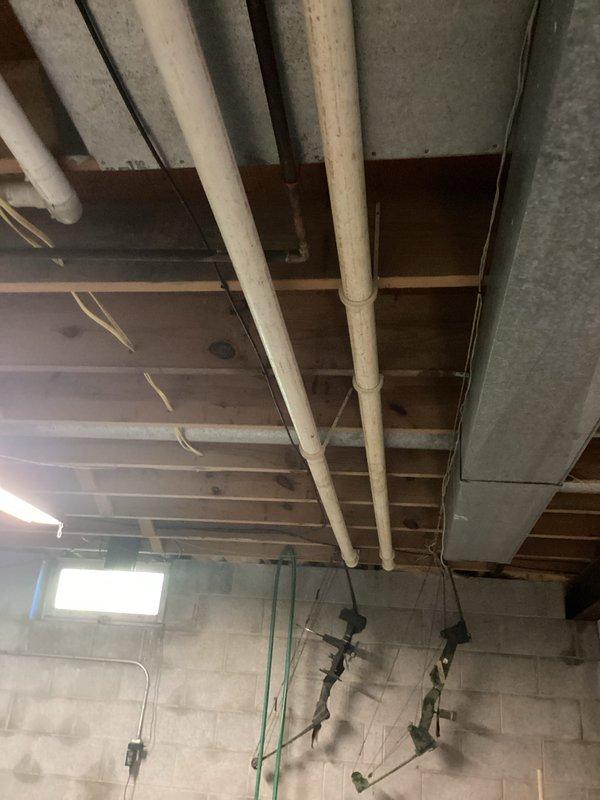 Performed a prepaid seasonal furnace tune-up as part of a recurring heating maintenance membership, inspecting the furnace, associated ductwork, and condensate drain piping in the unfinished basement. Verified the PVC drain lines and galvanized supply ducting were properly supported and free of visible damage, and confirmed the system was operating safely and ready for the heating season.