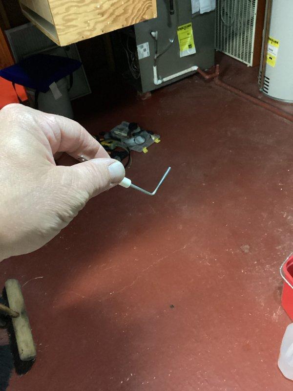 Performed a furnace tune-up, inspecting the ignition system and removing the igniter/flame sensor probe for evaluation. Conducted a combustion analysis with a Testo 310 flue gas analyzer on natural gas, recording a stack temperature of 102.3°F, O₂ at 11.9%, CO at 8 ppm (19 ppm air-free), CO₂ at 5.10%, excess air at 117.1%, and combustion efficiency of 92.3%. Readings indicate safe CO levels and efficient operation.
