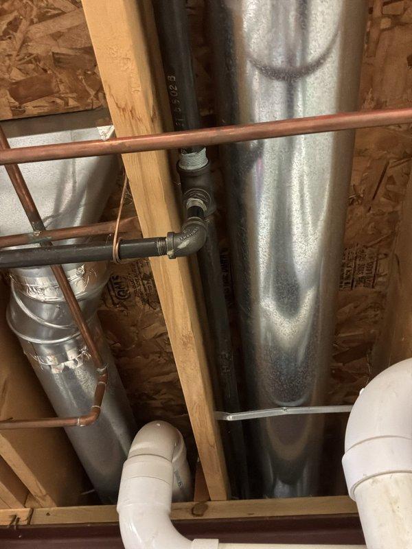 Performed an on-site estimate for water heater replacement, evaluating options for customer-supplied or contractor-supplied unit installation. Inspected the existing gas-fired tank-type water heater, including the galvanized flue, gas supply with shutoff valve, copper water lines, and surrounding basement piping and ductwork, and found no visible corrosion, leaks, or damage. Documented existing conditions and clearances to determine the scope of work for installation.