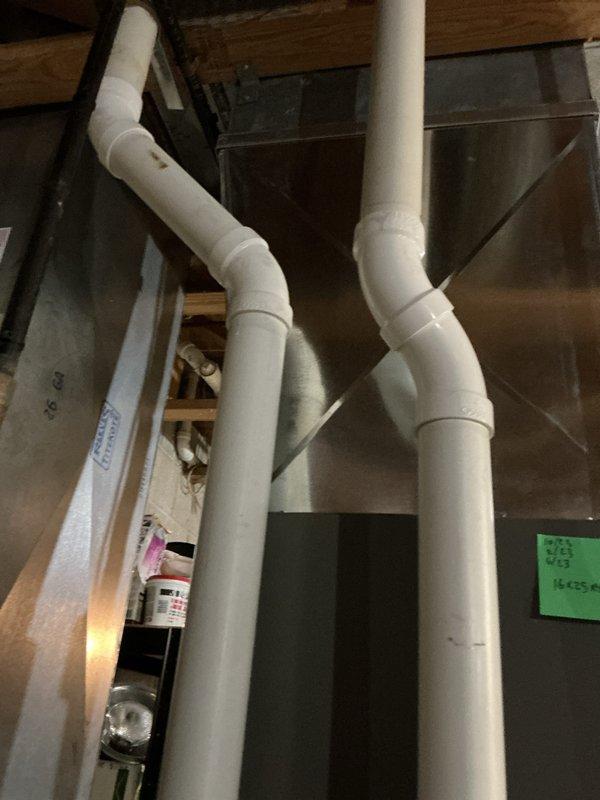 Performed a seasonal tune-up on a Lennox gas furnace, including inspection of the unit, PVC intake/exhaust venting, flexible vent connection, electrical conduit and junction box, and surrounding ductwork. Verified the 16x25 filter size noted on the return and found no visible rust, cracks, or frost damage, with all connections in place and the system ready for winter operation. Noted minor discoloration near an upper PVC elbow for monitoring.