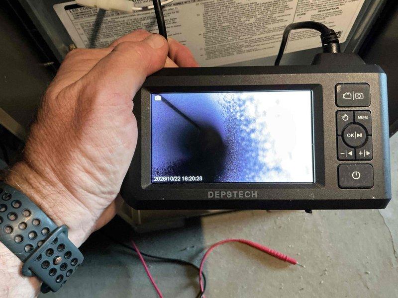 Performed a furnace tune-up, including inspection of the heat exchanger with a borescope camera and removal and inspection of the flame sensor/igniter assembly. Verified component condition and operation as part of the seasonal maintenance to ensure safe, efficient furnace performance.