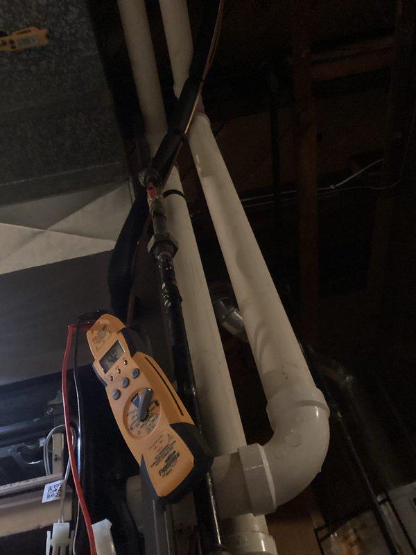 Performed a furnace tune-up, inspecting the inducer blower assembly, wiring harness connections, gas valve, gas piping, and pressure switches, with all components found secure and free of visible rust, cracks, or frost. Verified electrical operation using a digital clamp meter and checked condensate and vent PVC piping and the surrounding air handler for proper condition. Unit operating normally at completion.