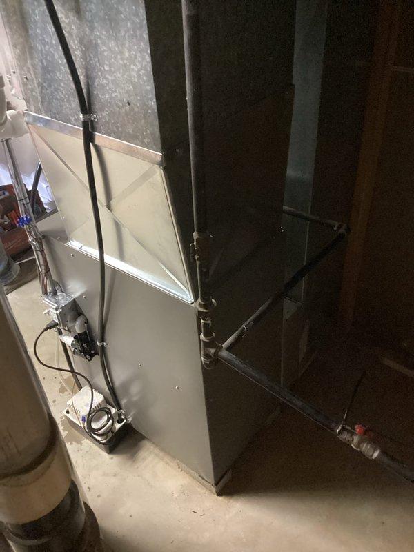 Installed a new Lennox gas furnace with a new thermostat and condensate pump, reusing the existing filter cabinet and adapting the new unit to the existing PVC venting and condensate drain piping. Connected electrical and gas supply, secured and sealed ductwork connections, and completed the installation under permit with electrical work performed. System was started, tested for proper operation, and verified.