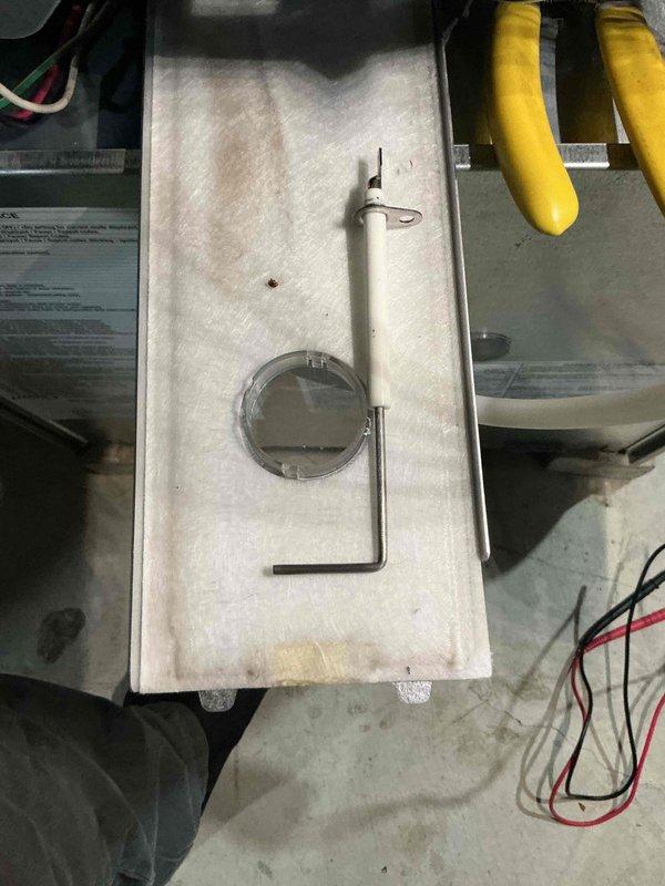 Performed a tune-up on a Lennox upflow gas furnace. Removed and serviced the flame sensor, inspected the burner assembly and sight glass, and verified secure wiring connections. Visual inspection of the unit, PVC vent piping, condensate drain, and electrical components showed no signs of rust, frost, or physical damage, and the furnace was reassembled and returned to service.
