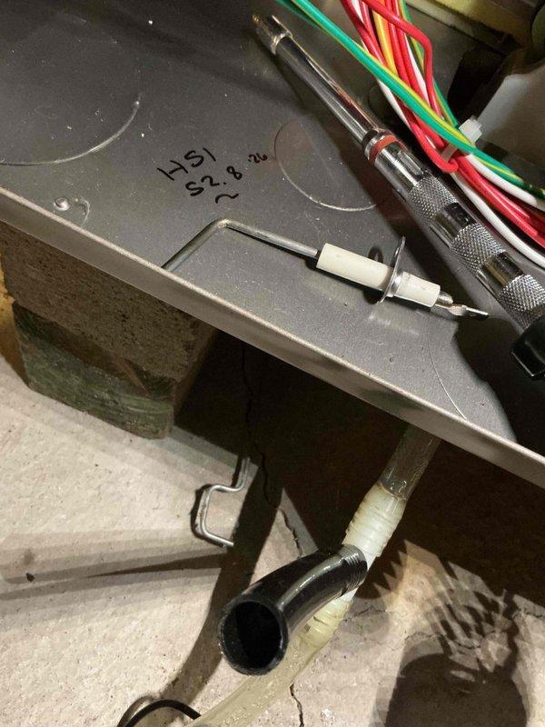Performed a furnace and A/C tune-up, including inspection and servicing of the heating and cooling systems. Removed the hot surface igniter (HSI) from the furnace for evaluation and testing of the ignition components, and verified the condensate drain line and associated tubing were properly routed.