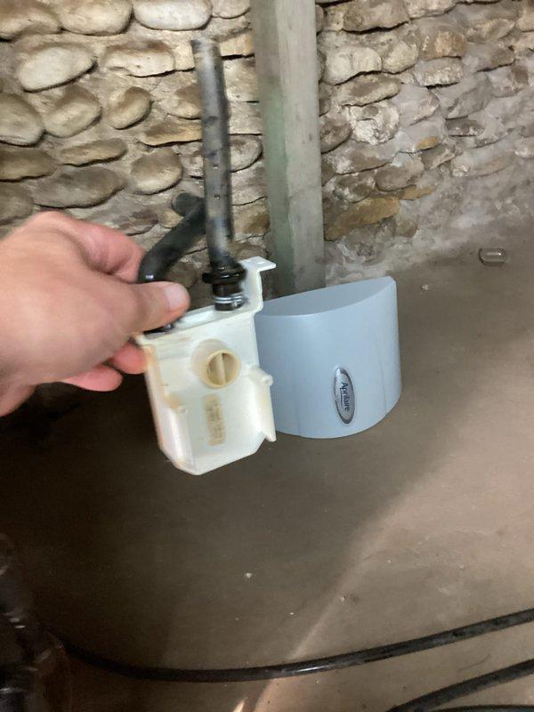 Performed a complete tune-up on the Daikin gas furnace, including inspection of the unit, venting, and electrical connections, and replaced the filter in the supply closet. Cleaned and inspected the Aprilaire humidifier, removing the water panel and distributor housing for service, and verified the associated air purification system. The system was checked for proper operation, with no signs of frost, rust, or damage observed.