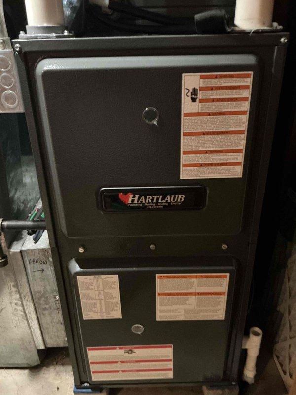 Performed a prepaid furnace tune-up on a gas-fired upright furnace, including visual inspection of the cabinet, venting, and ductwork connections with no signs of damage, corrosion, or leaks noted. Conducted a gas line tightness test using a digital manometer, monitoring pressure over a 10-minute test period to verify system integrity. Unit was left in good operating condition.