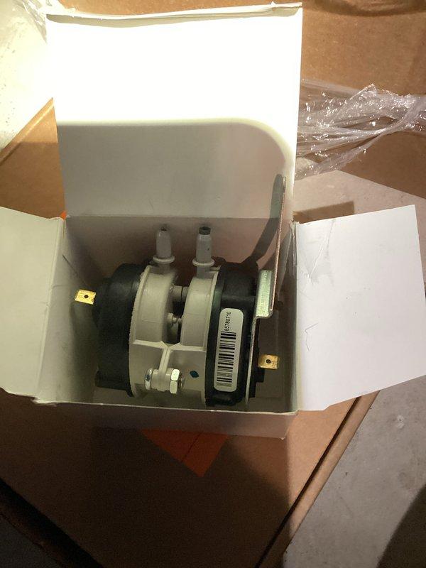 Installed a new collector box, pressure switch, and integrated furnace control circuit board under manufacturer warranty, verifying all components were new and undamaged prior to installation. Reconnected wiring and pressure tubing, confirmed proper system operation, and completed a furnace tune-up as part of the recurring maintenance visit.