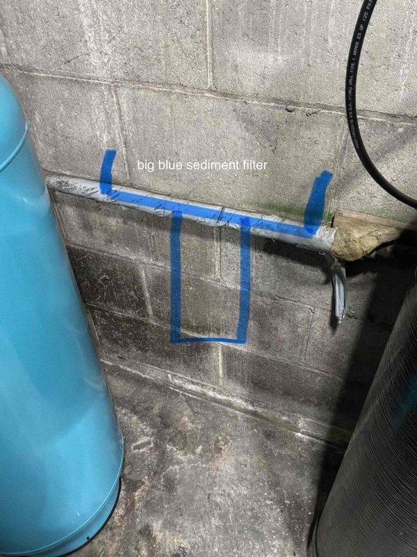 Performed on-site evaluation and provided estimates for water heater replacement and additional water line repair. Inspected the utility room's existing equipment, including the pressure tank with copper piping, pressure switch and gauge, the water treatment tank with digital control head, and the large blue sediment filter with insulated supply piping showing wear and loose insulation. Documented system conditions with photos to support the replacement scope and recommended water line repairs.