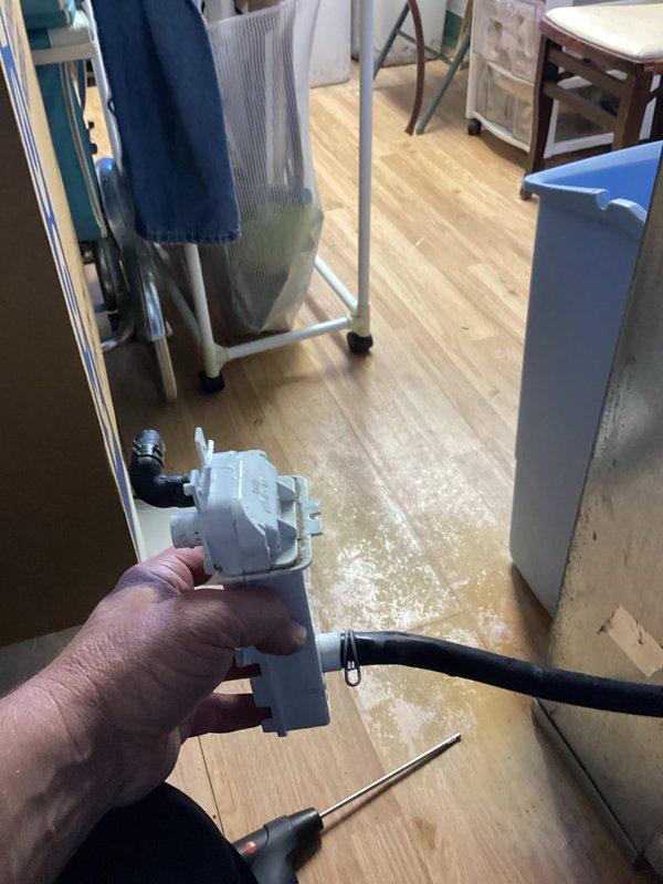 Performed a scheduled furnace tune-up as part of a recurring heating maintenance visit, including a combustion analysis with a Testo 310 II flue gas analyzer on natural gas. Readings were within normal range: 5 ppm CO (14 ppm air-free), 13.2% O₂, 4.37% CO₂, and 91.2% combustion efficiency. Also inspected the water inlet valve/pump assembly and hose connection, noting mineral deposits and signs of moisture on the surrounding floor.