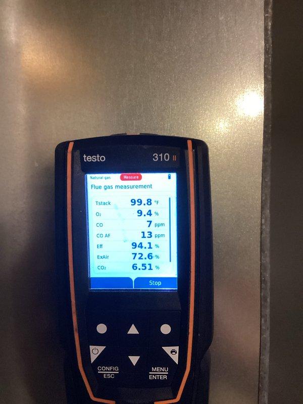 Performed a furnace tune-up, inspecting the gas valve, control board, wiring connections, and internal components. Verified combustion performance with a flue gas analyzer on natural gas, recording a stack temperature of 99.8°F, CO at 7 ppm, O2 at 9.4%, CO2 at 6.51%, and 94.1% efficiency, all within normal operating parameters.
