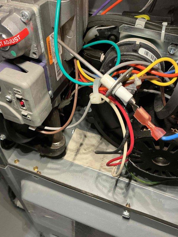 Performed a complete furnace tune-up, inspecting the gas valve assembly, igniter/flame sensor, wiring harness, and blower motor assembly. Verified secure wiring connections and component integrity, with no signs of rust, breakage, or damage found. Unit data plate and serial information were documented, and the furnace was left in good operating condition.