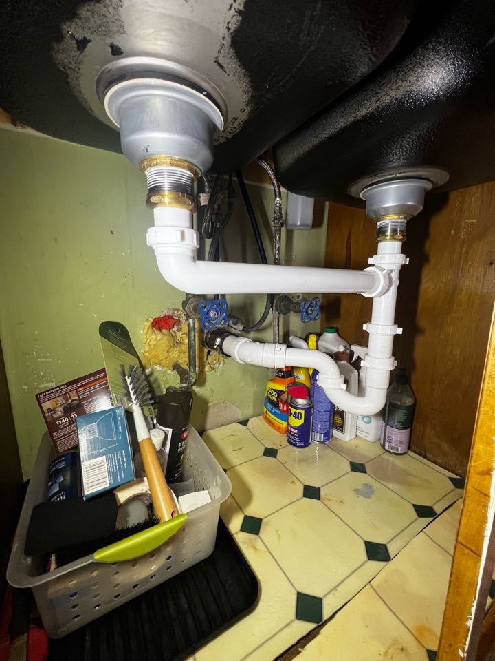 Re-piped a double bowl kitchen sink drain in Waldorf, Maryland
