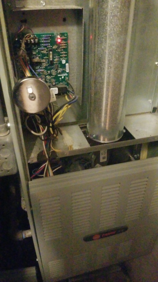 Furnace repair on American Standard gas furnace.  Replace control panel 