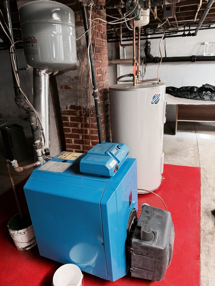 Berryville, VA - Oil hydronic boiler maintenance call. Performed oil burner tuneup on Beckett NX burner. Changed oil, nozzle and oil filter. Cleaned and adjusted oil burner electrodes. Performed hydronic boiler tuneup on Buderus. Berryville, VA - Oil hydronic boiler maintenance call. Performed oil burner tuneup on Beckett NX burner. Changed oil, nozzle and oil filter. Cleaned and adjusted oil burner electrodes. Performed hydronic boiler tuneup on Buderus.