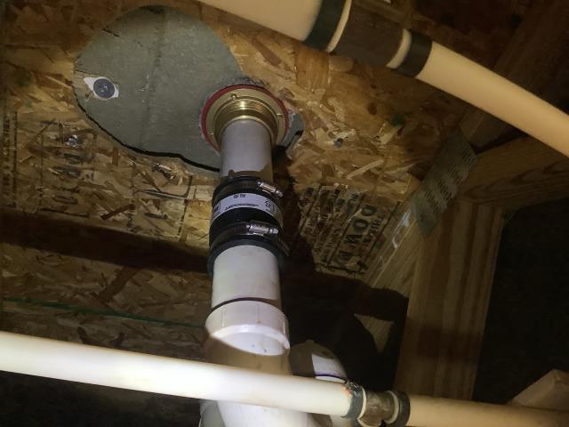 Pride Plumbing was called out to investigate the source of a water stain on a downstairs ceiling. We found the leak was coming from an upstairs shower drain - the drain's nut was loose. We tightened the nut, tested the drain, and the issue was corrected.