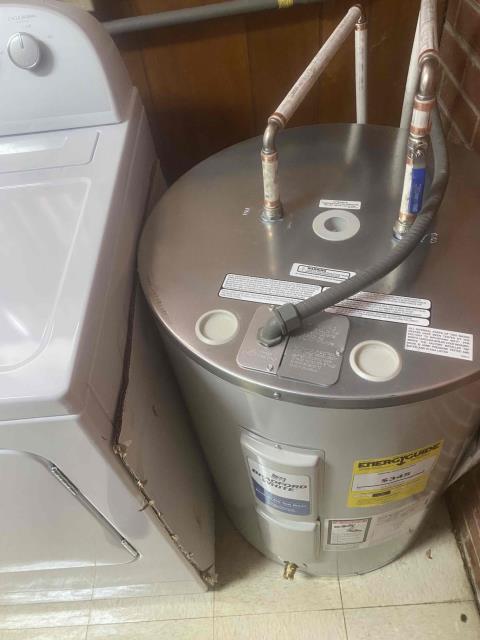 Pride Plumbing came out and replaced an aging and leaking 38-gallon electric low-boy hot water heater with a new 38-gallon electric Bradford White low-boy model. This included removing and disposing of the old water heater; installing the new water heater, new ball water shut-off valves, new PEX and stainless steel water supply lines to the water heater connectors, a brass drain valve, ensuring the unit was properly vented, wiring the water heater's electrical connections, and setting it to its appropriate operating temperature.