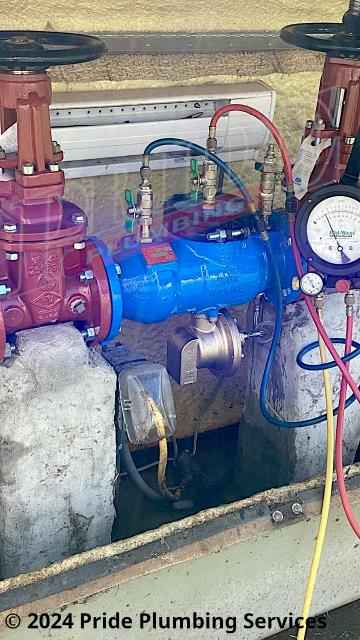 Pride Plumbing came out and replaced a leaking Zurn Wilkins reduced pressure zone (RPZ) backflow with a new Zurn Wilkins 375 model. We removed the old backflow; installed the new backflow assembly with new Bavco flange gaskets, bolts and nuts; turned the water back on and checked for leaks. We tested the RPZ assembly and it passed inspection. Pride Plumbing filed the appropriate certification paperwork with the county.