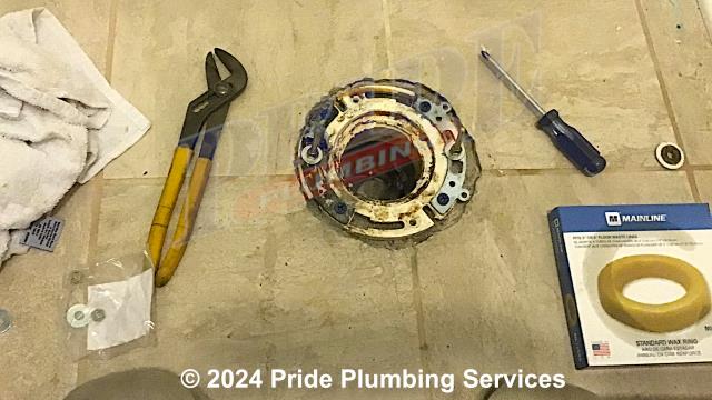 Pride Plumbing was called out for a basement sewage pump not working. We pulled and inspected the pump and found that the unit's float was stuck. We repositioned the float, reinstalled the pump, tested the unit, and the issue was corrected. We also repaired a broken flange on a toilet. We pulled the toilet, cleaned the wax ring gasket off, installed a new Fernco SF-100 metal repair spanner flange, installed a new wax ring gasket, replaced the toilet bolts, reset the toilet, added two plastic shims underneath the toilet bowl to level it, tested for leaks, and the issue was corrected. Finally, we provided a cost estimate to perform a descale service on a tankless water heater.