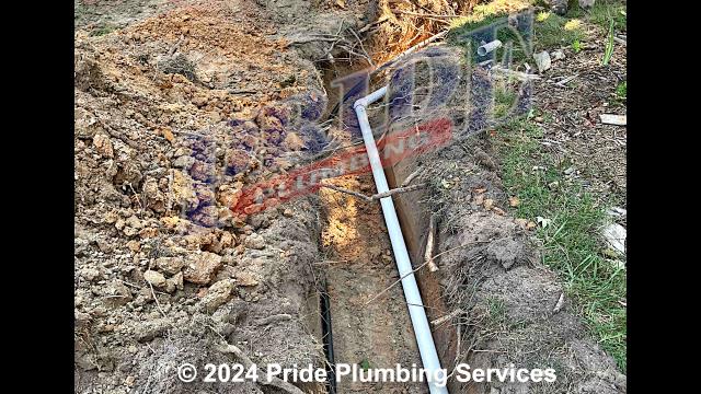 Pride Plumbing came out and performed the following work: 1) dug a ditch for a new sewer line from the house to a location in the yard; 2) installed new tracer wire, 4-inch PVC piping and fittings, and 2-way cleanouts in the new sewer line ditch; 3) dug a 9'x9' hole at the end of the ditch in the yard, installed a new E/One sewage pump system along with gravel as a base layer; 4) installed 1-yard of concrete around the pump's basin after its tank had been inspected and approved; 5) had an electrical contractor install the wiring for the new pump; 6) dug another ditch from the new E/One pump system to the town's sewer tap and hooked up to it; 7) tested the new pump and drain lines for working order; 8) backfilled the ditches and spread grass seed and straw after the work had been inspected and approved; and 9) trenched a ditch from an existing water meter to the home and replaced the black roll main outside water supply line with new PVC pressure piping and fittings along with installin