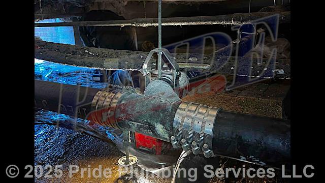 Pride Plumbing came out and repiped and replaced the cast iron drain lines underneath the building in the crawlspace - installing new cast iron piping, fittings and supports under the building for each fixture served.