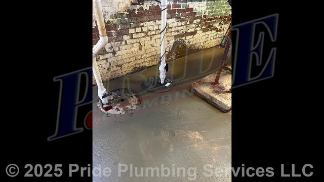 Pride Plumbing came out and performed the following work in the building's basement: 1) reusing an existing pit that the floor drains piped into, we installed a new Liberty sewage pump with no catch float; installed a new PVC drain line and check valve for the new pump along with a ball valve and union; installed a new Liberty NightEye alarm system on the discharge piping to help monitor the pump; and tested the pump and alarm for working order; and 2) cut and removed concrete to install a new catch basin; dug dirt out for the new catch basin; cut a hole in the existing pump pit for a 4-inch overflow pipe; installed a new catch basin and Liberty sewage pump along with a 4-inch pipe to ensure that the overflow pump comes on before the floor drains overflow; installed a new 2-inch discharge line to outside; poured concrete around the new catch basin; and tested the new pump system for proper working order.