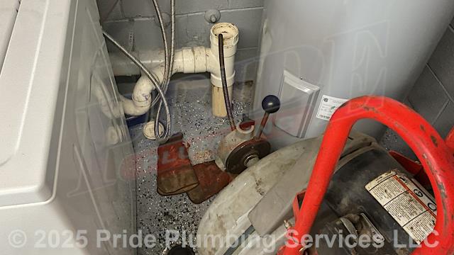 Pride Plumbing was called out for a clogged drain line in the laundry room. We used a sewer machine down through the drain and cleared the blockage. The customer also wanted us to look at a loose toilet. We pulled the toilet; cleaned the wax ring gasket off; found that the closet flange was broken and ground it off; installed a new Oatey 43539 PVC replacement closet flange; installed a new wax ring gasket; replaced the toilet bolts and caps; reset the toilet; added six plastic shims underneath the toilet bowl to level it; tested for leaks; caulked around the base of the toilet bowl; and tested for stability, leaks and proper operation with no issues. We also provided a cost estimate to trench a ditch from the town sewer tap to the building to expose and replace the main outside sewer septic drain line with new PVC piping and fittings along with installing proper cleanouts and fittings per code.