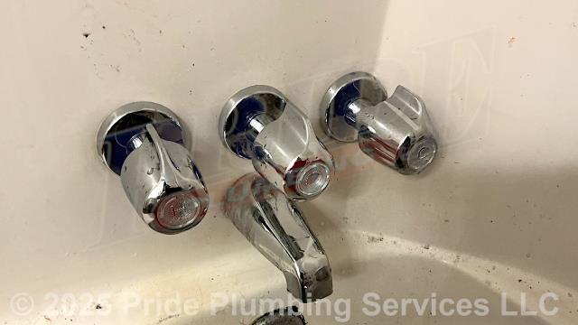Pride Plumbing was called out for a broken Gerber three-handle bathtub/shower valve - one of the handles had stripped off. After cutting an access hole in the shower wall, we replaced it with a new Gerber three-handle model along with 1) replacing the valve's handles, shower head and downspout diverter); and 2) converting the valve's copper above-floor hot and cold water supply lines to PEX piping and stainless-steel fittings; tying them into the building's existing copper main water lines. Finally, we installed a plastic plumbing access panel over the hole we cut in the wall.