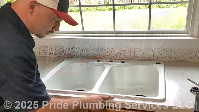 Pride Plumbing came out and performed the following work: 1) installed a new two-compartment stainless steel kitchen sink (along with its basket strainers, P-trap, end outlet waste, dishwasher tailpiece, PVC drain line (tying into the existing drain line under the house), and hot and cold PEX and stainless steel braided water supply lines and their water supply stops); 2) installed a kitchen sink faucet; 3) installed an air admittance valve on the sink's drain line; 4) reconnected a Pentair Everpure 4CB5 water filter; and 5) caulked around the sink.