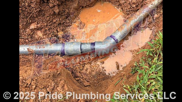 Pride Plumbing was called out for a water leak in the yard. We used an excavator, dug down, and found a leak on a section of the Schedule 80 PVC outside main water supply line at an elbow. We cut out the faulty section of pipe and repaired it with new Schedule 80 pipe, a Schedule 80 coupling, and a Schedule 80 45-degree elbow.