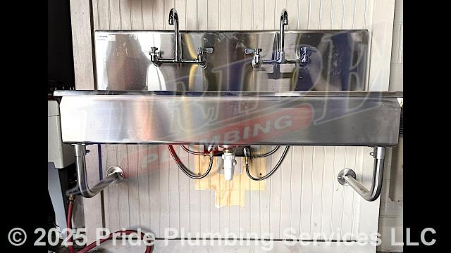 Oakboro, NC - Pride Plumbing came out and performed the following work: 1) removed a ceramic handwash sink and replaced it with a new stainless-steel handwash sink; and 2) installed two new T&S faucets on the sink and made the appropriate braided stainless-steel hot and cold water supply line and PVC P-trap and drain assembly connections. Oakboro, NC - Pride Plumbing came out and performed the following work: 1) removed a ceramic handwash sink and replaced it with a new stainless-steel handwash sink; and 2) installed two new T&S faucets on the sink and made the appropriate braided stainless-steel hot and cold water supply line and PVC P-trap and drain assembly connections.