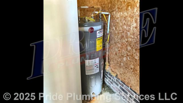 Pride Plumbing came out and replaced a leaking 40-gallon electric A.O. Smith water heater with a new 40-gallon electric Rheem PROE40-M2-RH95 model. First, after disconnecting its electrical connections and inlet and outlet water lines, we removed and disposed of the old water heater. Then we installed the new water heater, ball water shut-off valves, PEX and stainless-steel water supply lines to the water heater connectors, a brass drain valve, and wired up the electrical connections to the new water heater (adding a Romex connector). Finally, we bled the air out of the water lines, ensured that the unit’s temperature and pressure (T&P) relief valve was properly vented, and set the unit to its appropriate operating temperature.