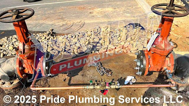 Pride Plumbing came out to remove a Watts LF009M3QT 6-inch backflow assembly and install a bypass from shut off number one to shut off number two. After shutting the water off to the building, we used a mini excavator to lift the old assembly out of place and then we capped off both shut off valves. We then installed a new copper bypass line from shut off valve number one over to shut off valve number two. After the bypass was installed, we turned the water back on and checked for leaks while the company's maintenance team went around and tested all the building's fixtures for water pressure and proper operation.