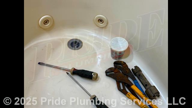 Pride Plumbing was called out for issues with phantom flushing from an American Standard toilet and a leaking bathtub drain. After inspection of the bathtub, we found that someone had used silicone underneath the bathtub's drain in an attempt to seal it, but it had deteriorated and was leaking. We removed the silicone and applied plumbers puddy in its place to fix the drain leaking issue. After inspection of the toilet, we found that its toilet tank flapper was leaking and needed to be replaced. We removed the old flapper and installed a new Lavelle 3060BP red Korky universal model. We then tested the toilet for proper operation with no further issues. We also provided a cost estimate to replace the toilet with a new Gerber Viper model.
