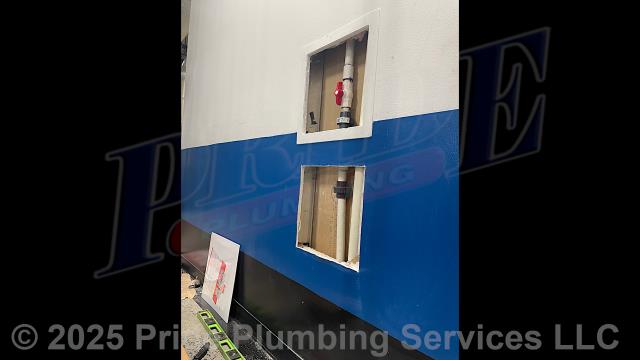Pride Plumbing came out and installed a Liberty Ascent II macerating toilet. This also required us to cut the sheetrock on the backside of the bathroom wall and install a new check valve on the pump's discharge drain line. After the installing two plastic plumbing access panels over the holes we cut in the wall, we tested for leaks and proper operation of the pump system.