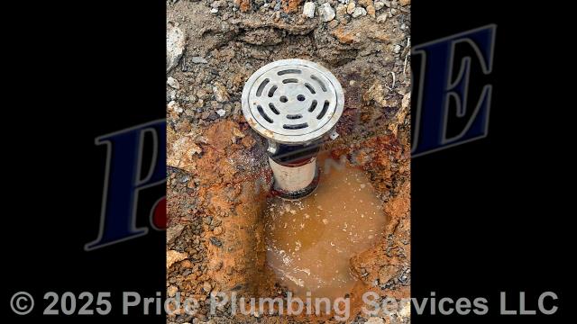 Pride Plumbing came out and performed the following work: 1) cut into and removed a small section of concrete flooring; 2) dug down to the base of the floor drain's P-trap and drain line; 3) removed the old floor drain and P-trap; 4) rebuilt the floor drain and its P-trap with new PVC piping and fittings up to the floor height (connecting onto the existing drain line using a new Fernco coupling); and 5) replaced the dirt and concrete we took out.
