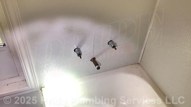 Pride Plumbing was called out for a two-handle bathtub/shower diverter not diverting the water and for the shower valve not turning the water off. We used new copper pipe and rebuilt the pipe that the diverter screwed onto. We then found that the customer had installed the valve's seats and springs backwards. Once we reversed them, reassembled the shower valve, and attached the diverter, we tested for leaks and proper operation with no further issues. We also provided a cost estimate to replace the shower valve with either a new Delta single-handle model or Gerber three-handle model (this would include cutting an access in the shower wall, replacing the valve along with short sections of its hot- and cold-water supply lines with new PEX piping and fittings, and adding new stems, washers, seats, handles, and escutcheons for the three-handle model).