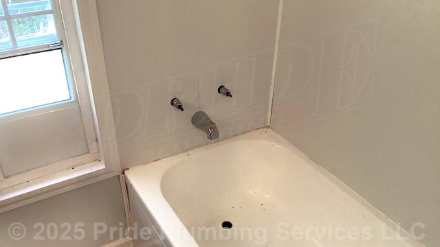 Pride Plumbing was called out for a two-handle bathtub/shower diverter not diverting the water and for the shower valve not turning the water off. We used new copper pipe and rebuilt the pipe that the diverter screwed onto. We then found that the customer had installed the valve's seats and springs backwards. Once we reversed them, reassembled the shower valve, and attached the diverter, we tested for leaks and proper operation with no further issues. We also provided a cost estimate to replace the shower valve with either a new Delta single-handle model or Gerber three-handle model (this would include cutting an access in the shower wall, replacing the valve along with short sections of its hot- and cold-water supply lines with new PEX piping and fittings, and adding new stems, washers, seats, handles, and escutcheons for the three-handle model).