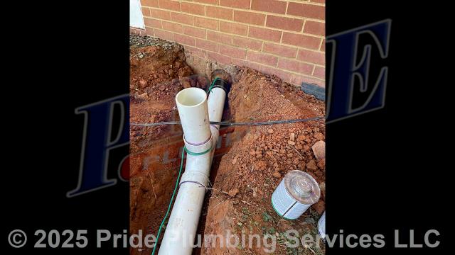 Pride Plumbing came out and performed the following work: 1) trenched a ditch from the house to the septic tank to expose and remove the outside main sewer septic drain line; 2) installed a new 4-inch PVC sewer drain line (connecting it to the main drain line under the home) along with proper cleanouts and fittings per code; 3) installed tracer wire in the ditch along with the new sewer drain line; and 4) sealed the septic tank penetration and backfilled, tamped, and spread grass seed and straw after the work had been completed.