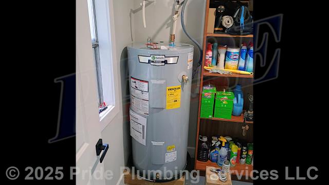 Pride Plumbing came out and replaced a leaking 50-gallon electric water heater with a new 50-gallon electric A.O. Smith ENS-50 110 model. First, after disconnecting its electrical connections and inlet and outlet water lines, we removed and disposed of the old water heater. Then we installed a water heater pan, the new water heater, a thermal expansion tank, ball water shut-off valves, PEX and stainless-steel water supply lines to the water heater connectors, a brass drain valve, and wired up the electrical connections to the new water heater (adding a Romex connector). Finally, we bled the air out of the water lines, ensured that the unit’s temperature and pressure (T&P) relief valve was properly vented, and set the unit to its appropriate operating temperature. We also provided a cost estimate to trench a ditch from the water meter to the home and replace the black roll main outside water supply line and pressure reducing valve (PRV) at the water meter.