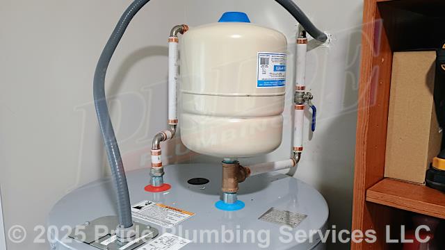 Pride Plumbing came out and replaced a leaking 50-gallon electric water heater with a new 50-gallon electric A.O. Smith ENS-50 110 model. First, after disconnecting its electrical connections and inlet and outlet water lines, we removed and disposed of the old water heater. Then we installed a water heater pan, the new water heater, a thermal expansion tank, ball water shut-off valves, PEX and stainless-steel water supply lines to the water heater connectors, a brass drain valve, and wired up the electrical connections to the new water heater (adding a Romex connector). Finally, we bled the air out of the water lines, ensured that the unit’s temperature and pressure (T&P) relief valve was properly vented, and set the unit to its appropriate operating temperature. We also provided a cost estimate to trench a ditch from the water meter to the home and replace the black roll main outside water supply line and pressure reducing valve (PRV) at the water meter.