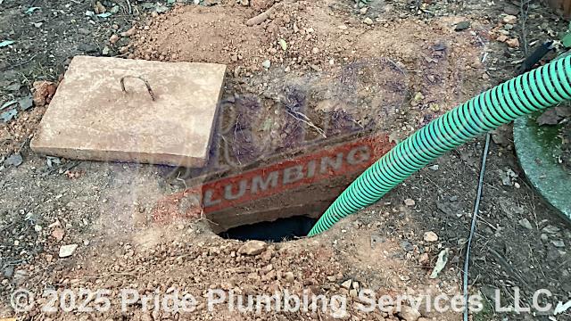 Pride Plumbing was called by the customer to come out and pump out their septic tank. We arrived with our septic pumping truck; located and uncovered the home’s septic tank, removed its lid, pumped it out, and cleaned the tank’s filter. When we went to check the drainpipes going to the tank for proper effluent flow, we found that there was a second drain line going to a second septic tank and it had a large root ball in it. We provided cost estimates to 1) dig up the drain line between the two septic tanks, replace it with new PVC piping and fittings, and reseal both tank penetrations; 2) pump out the second septic tank; 3) pull and clean a sewage ejection pump and replace its float switch and check valve.