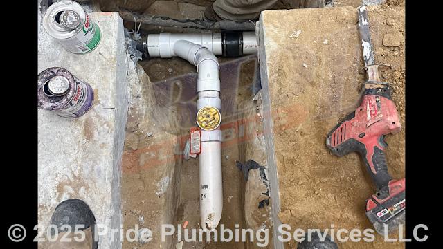 Pride Plumbing came out and performed the following work: 1) cut into and removed a small section of concrete flooring; 2) dug down to the base of a drain line; 3) cut out and removed a defective section of the drain line; 4) rebuilt the drain line with new PVC piping and fittings up to the floor height (adding a cleanout and connecting onto the existing drain line using new Fernco couplings); and 5) replaced the dirt and concrete we took out.