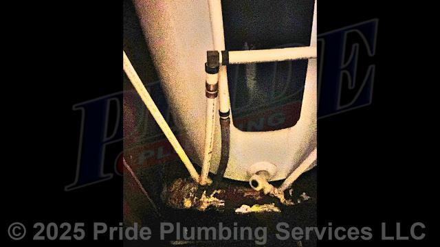 Pride Plumbing was called out for a water leak at a 40-gallon electric Whirlpool E2F40RD045V water heater. We found a leak on a polybutylene water supply line. After shutting off the water, we cut out the leaking section of pipe and repaired it with new PEX piping and fittings. We then cut the water back on, drained out any debris at an outside hose bib spigot, and tested for leaks with no further issues.