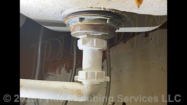 Pride Plumbing was called out for a water leak underneath a kitchen sink. Our inspection found that the PVC drain flanged tailpiece had broken off from its basket strainer. We replaced the flanged tailpiece, flanged tailpiece washer, and slip joint nuts, and tested for leaks with no further issues.