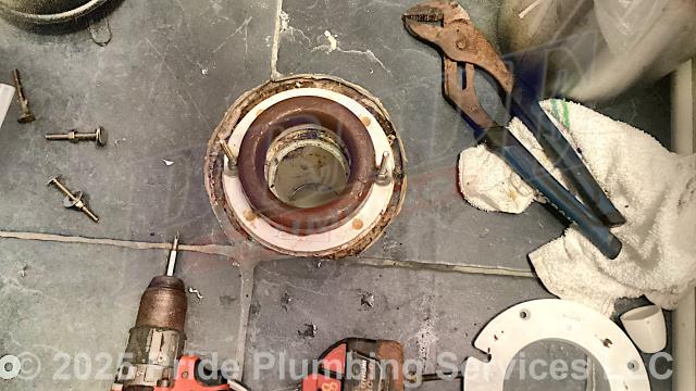 Pride Plumbing was called out for an American Standard toilet bowl leaking at its base and a water leak at a reverse osmosis (RO) water filter system in the basement. For the toilet, after pulling it, we found that its flange was too low in the floor and hadn't been raised when new flooring had been put down. We installed a new BruCo CF300 closet flange extension kit and applied silicone to the spacers. We reset the toilet with new toilet bolts and two new wax ring gaskets and tested for leaks with no further issues. For the water leak, we cut out the leaking section of pipe and repaired it with new PEX piping and fittings.