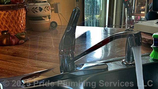 Pride Plumbing came out and performed the following work: 1) replaced a two-handle gooseneck-style kitchen sink faucet and sprayer with a new Delta single-handle model with a sprayer (this included removing the old faucet, mounting the new faucet, connecting the sprayer, and replacing the hot and cold above-floor water supply lines underneath the sink with new braided stainless-steel ones and connecting them to the water supply stops and faucet); 2) replaced a leaking two-handle bathtub/shower faucet valve with a built-in downspout diverter with a new two-handle model with a built-in downspout diverter (this included cutting an access in the shower wall and replacing the valve along with short sections of its hot- and cold-water supply lines with new PEX piping and fittings); and 3) pulled and reset a Gerber toilet due to it having a broken closet bolt.