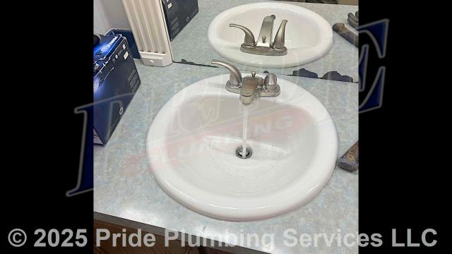 Pride Plumbing came out and 1) removed a bathtub/shower and installed a new 4-piece walk-in unit along with installing a new Delta shower valve with trim (handheld shower head, faucet valve handle and cover, and drain cover), Watco PVC drain, PEX hot and cold water supply lines with shut-offs, and a plastic plumbing access panel along with connecting the new drain and water supply lines to the existing drain and water connections underneath the home; 2) in a guest bathroom, replaced a defective bathtub/shower drain with a new twist and turn drain and replaced the anti-scald cartridge in its Delta shower valve; and 3) in the master and guest bathrooms, installed two bathroom sinks (one new and one reused) and Peerless faucets, hot and cold above-floor braided stainless steel water supply lines, popup assemblies, P-traps, and drain tailpieces.