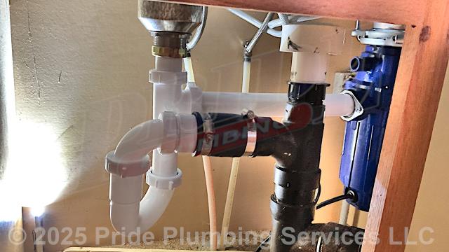 Pride Plumbing came out reinstalled a kitchen sink and faucet with sprayer and reconnected and reinstalled a Kenmore 175 garbage disposal since the countertops were replaced. We cut off the water and reinstalled the sink, P-trap and drain assembly, faucet and sprayer and water supply lines, and garbage disposal that we had previously removed.