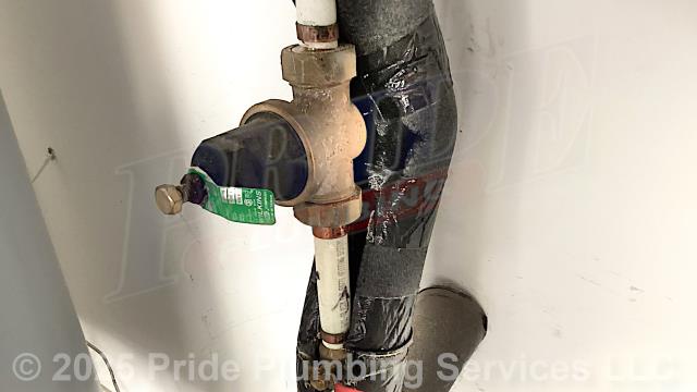 Winston-Salem, NC - Pride Plumbing came out and performed the following work: 1) replaced a faulty pressure reducing valve (PRV) in the basement (attaching it to the existing main water supply line with new PEX piping and fittings and adding a ball water shutoff valve) with a new Watts LFN45BM1-DU-PEXXPEX model due to high water pressure in the home (100+ PSI); and 2) replaced the T&P relief valve on a 50-gallon electric A.O. Smith E6-50R45DV 110 water heater, ensuring that it was properly vented.